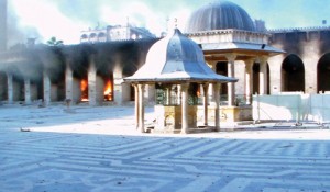 Fire burns after shelling at the Grand Umayyad mosque in Aleppo